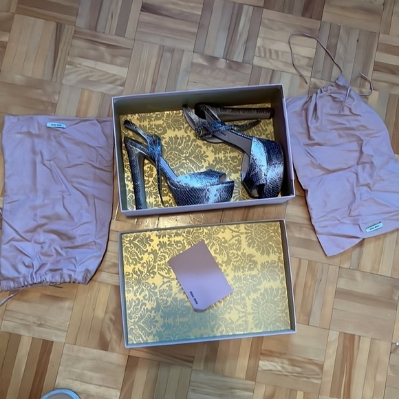 Miu Miu
Beige & Grey Embossed Leather Platform Heel - Picture 10 of 13